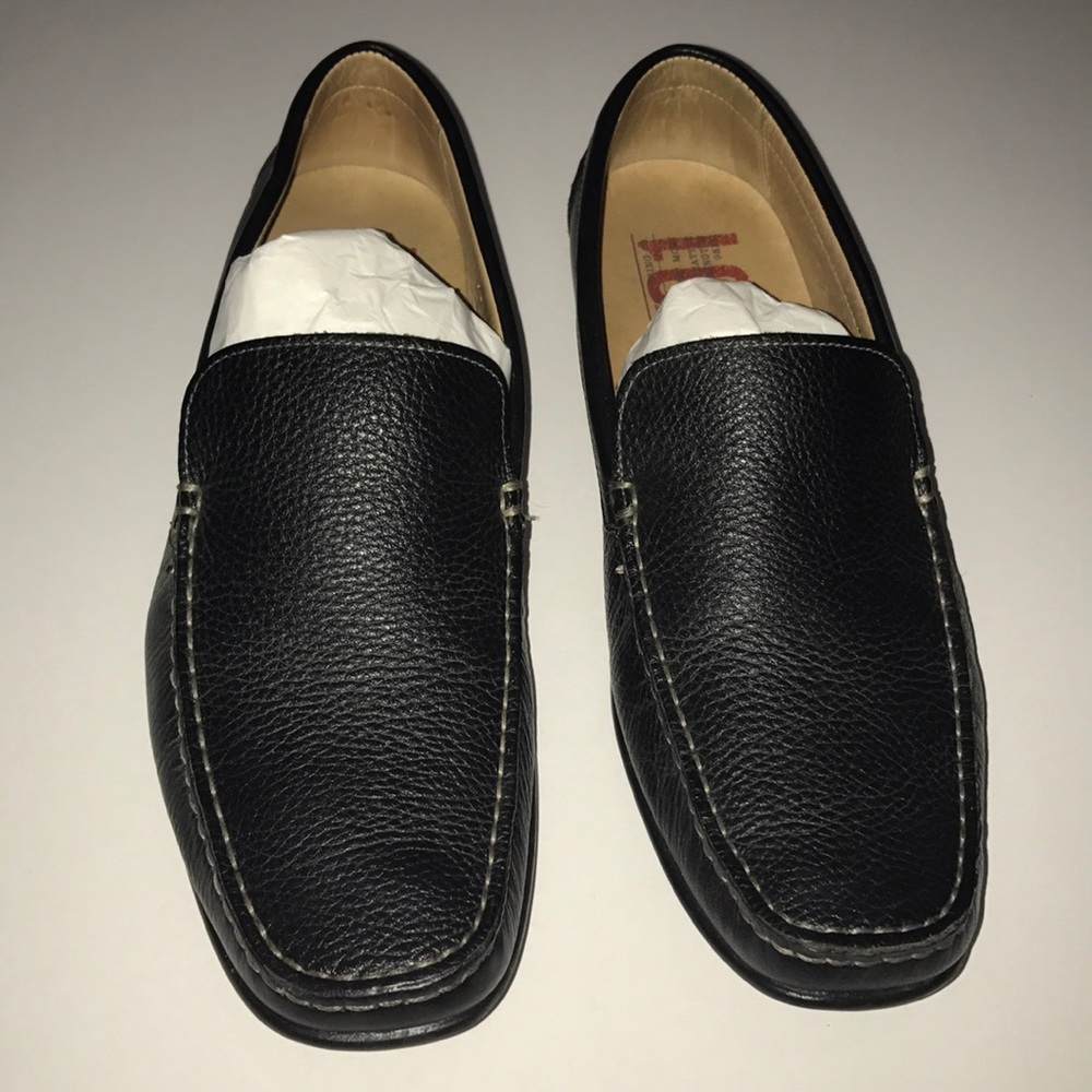 Black leather 1901 driving shoes.